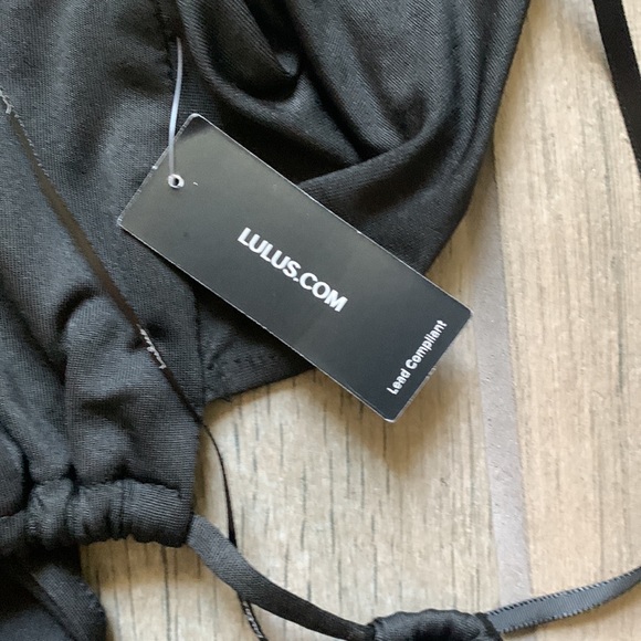 Lulu’s black dress with cross cross and cutouts - Picture 9 of 10